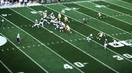 American football game in play