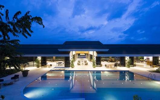 tropical hotel at night pool view