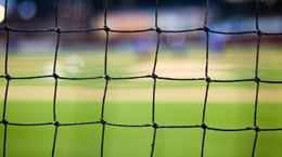 Looking at a field through a soccer net