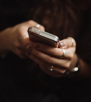 woman texting on phone