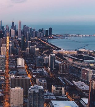 An aerial view of Chicago looking out over Lake Michigan.