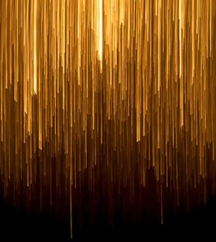 gold lights hanging on black background
