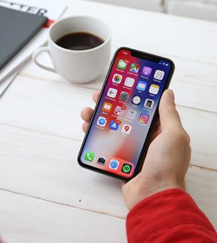 person holding unlocked phone screen