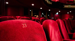 A view of empty red theater seats