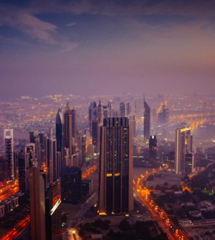 A view of the city of Dubai at sunrise