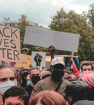A group of people participate in a protest