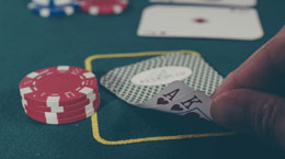 Someone shows two cards in a casino card game