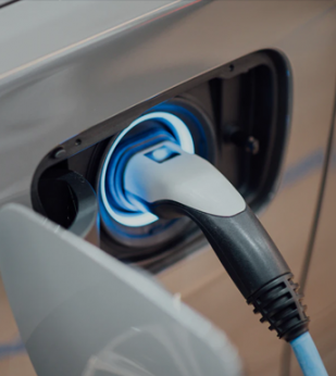 An electric car is plugged in